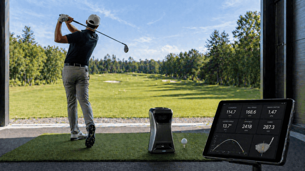 a person using a golf launch monitor